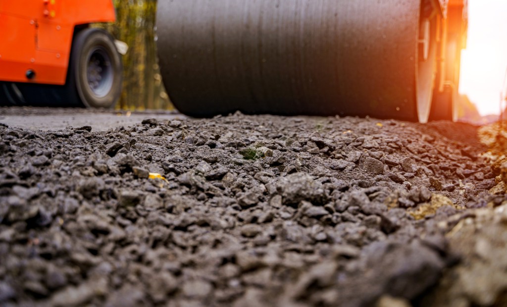 A traditional asphalt road like this one may look the same and perform better with plastic waste baked into it.