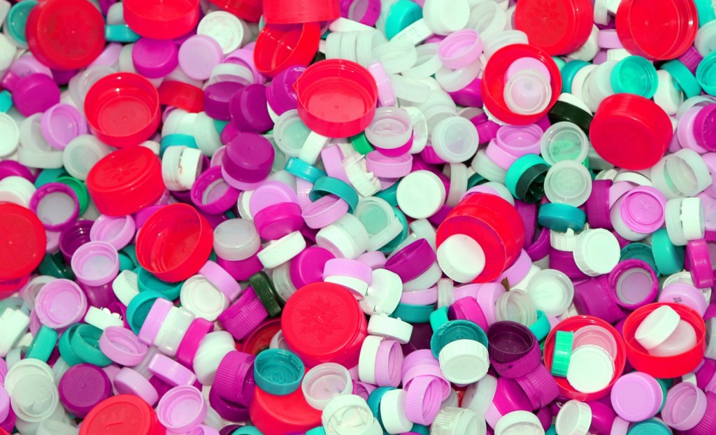 A pile of plastic bottle caps