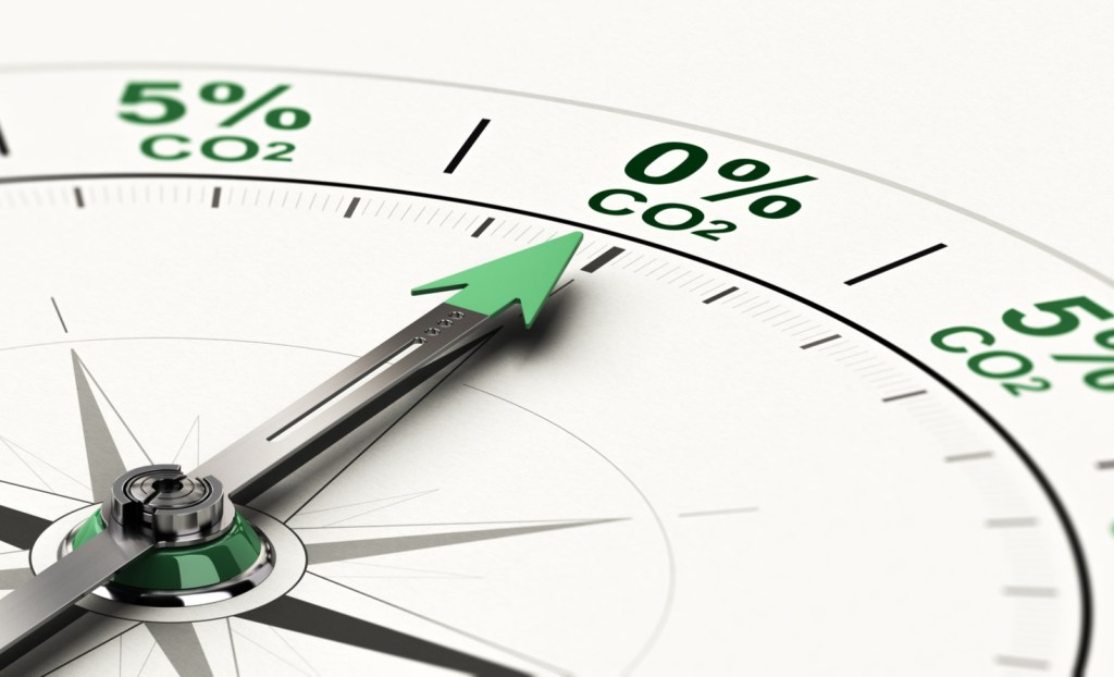 compass pointing at carbon dioxide