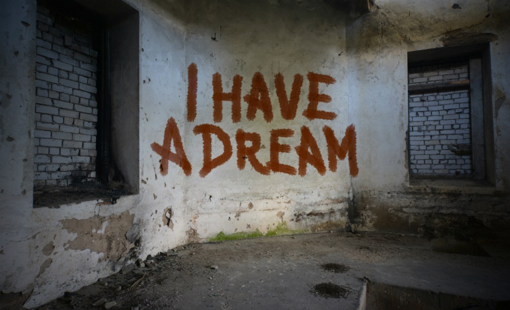 "I have a dream" graffiti on abandoned house wall