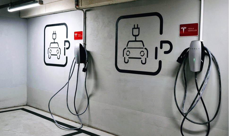 EV plug-in car charging station in an underground parking lot in Warsaw