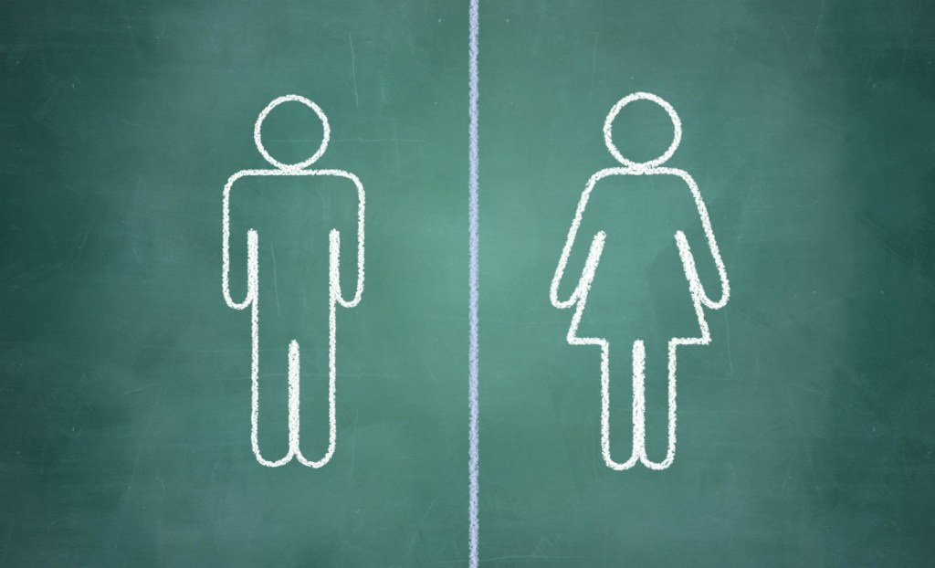 Male and female figures on chalkboard