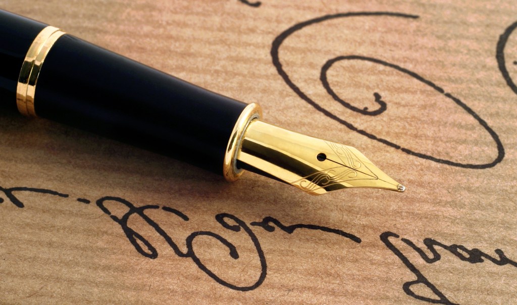 Golden calligraphy pen