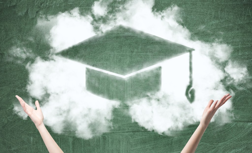 A graduate cap drawn on a chalkboard