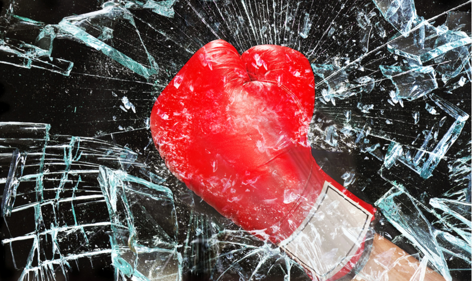 Boxing glove breaking glass