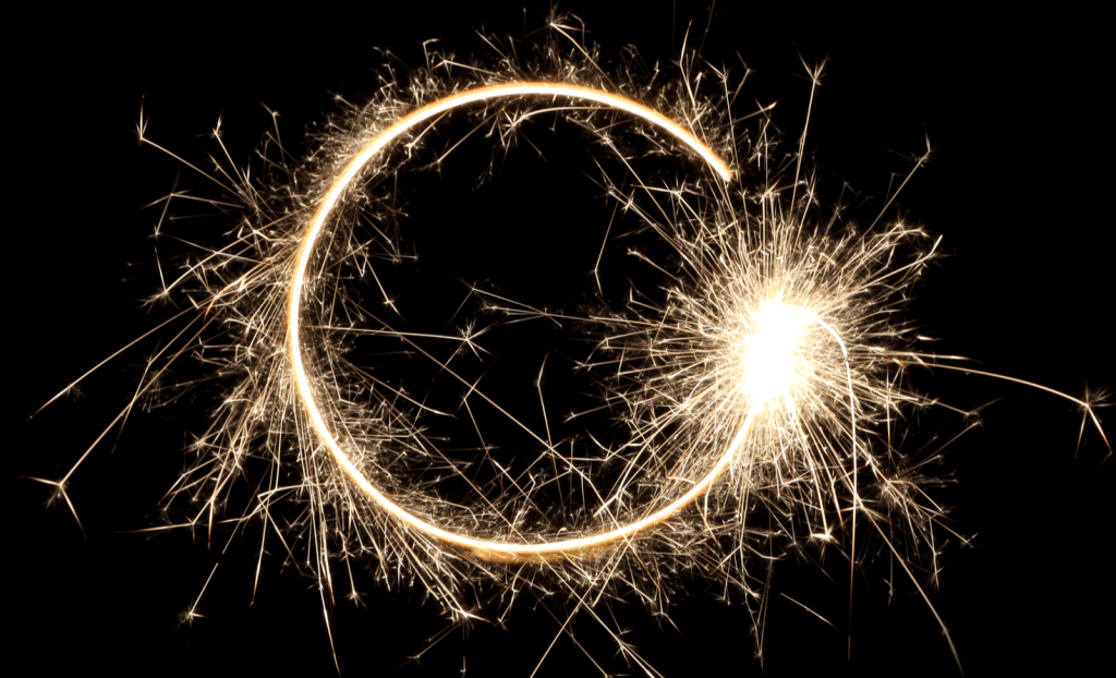 sparkler drawing a circle on night sky