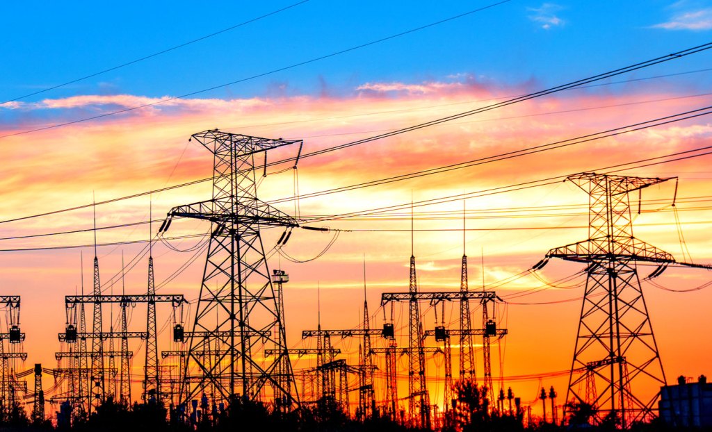 Utility towers on a river