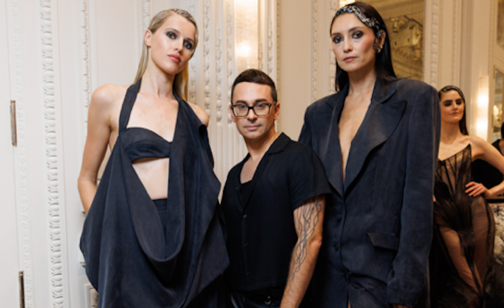 Designer Christian Siriano with models wearing fashions of lyocell recycled from polycotton waste by Circ.