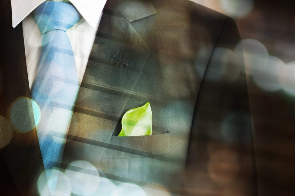 Business suit with a leaf in the pocket.
