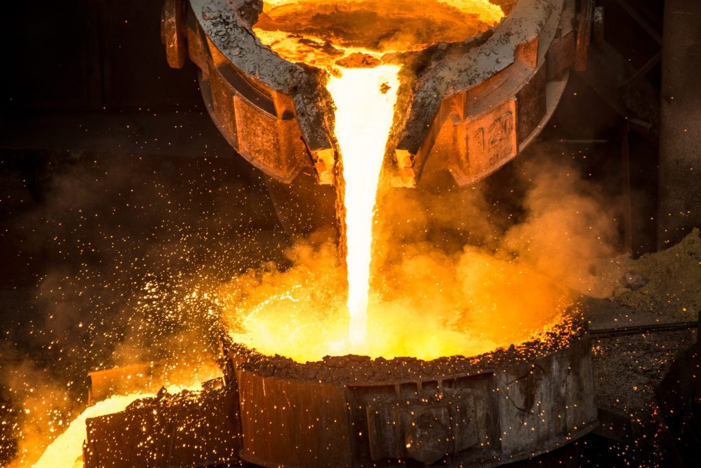 Tank pours liquid metal at a steel mill