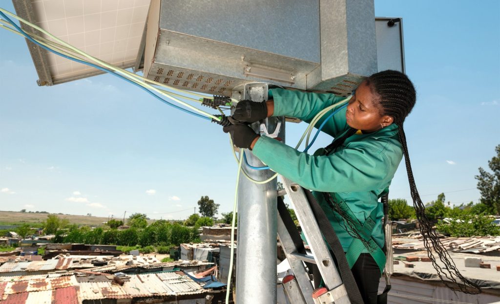 Solar power being installed in the densely populated township of Diepsloot in South Africa.