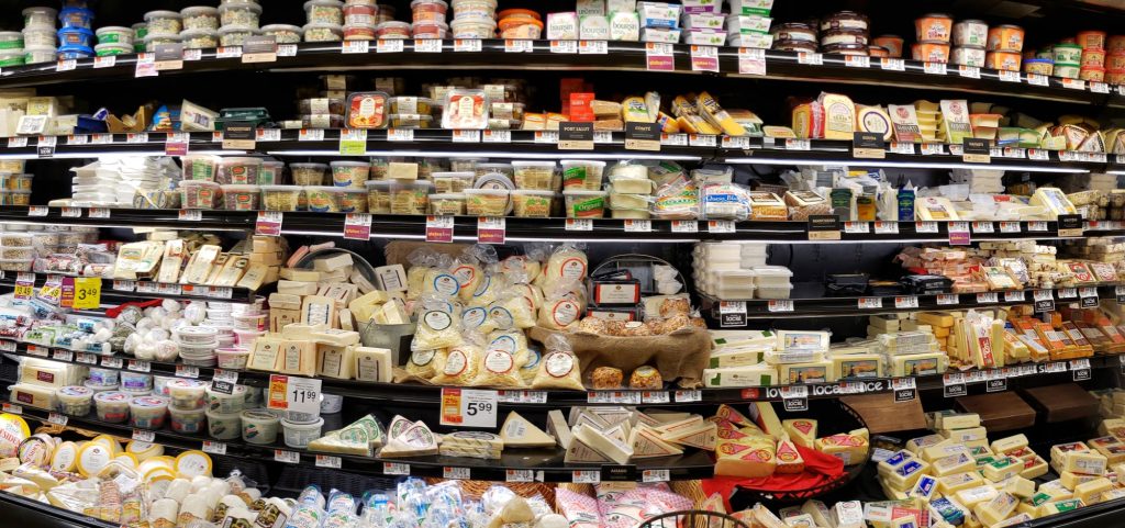 Cheese shelves in a Hannaford supermarket.