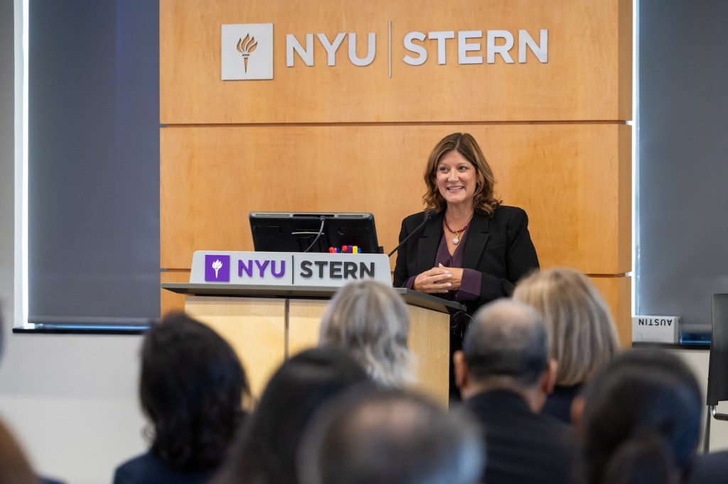 Woman speaking at podium