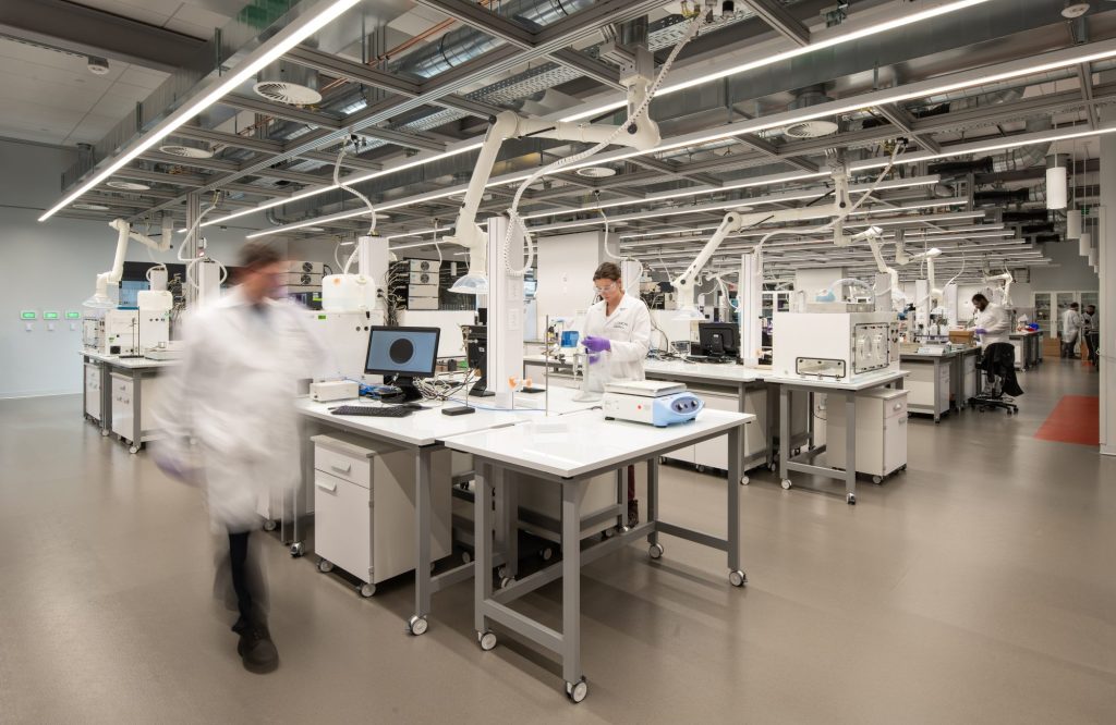 product development laboratory with several individuals in the background