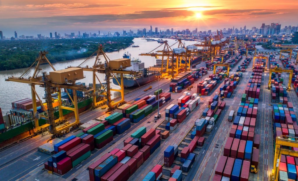 Aerial view of container port and ships.