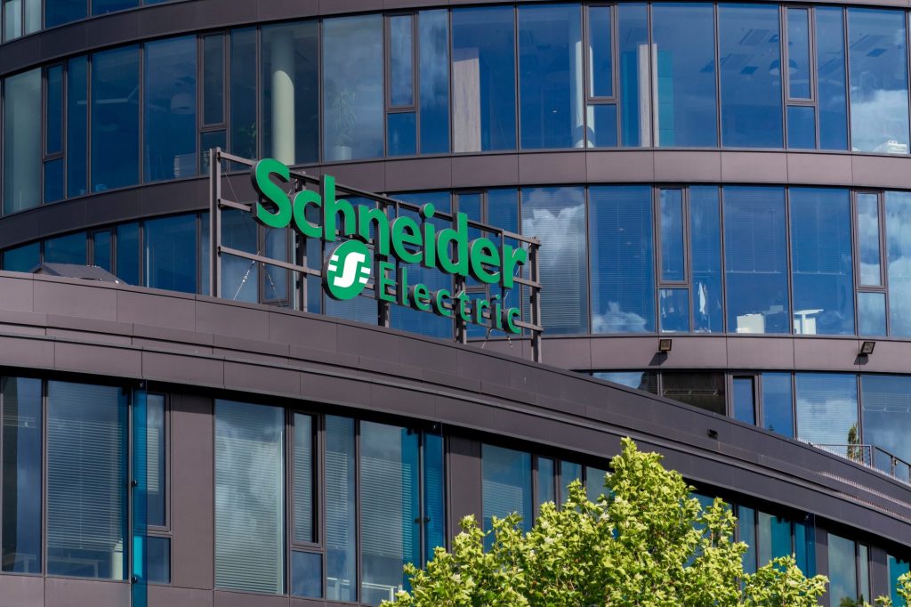 Schneider Electric automation and energy management company logo on headquarters.
