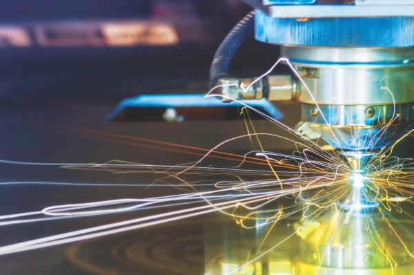 Manufacturing machine creating sparks.