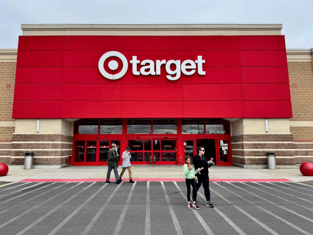 People walking out of the front of a Target store in New Jersey
